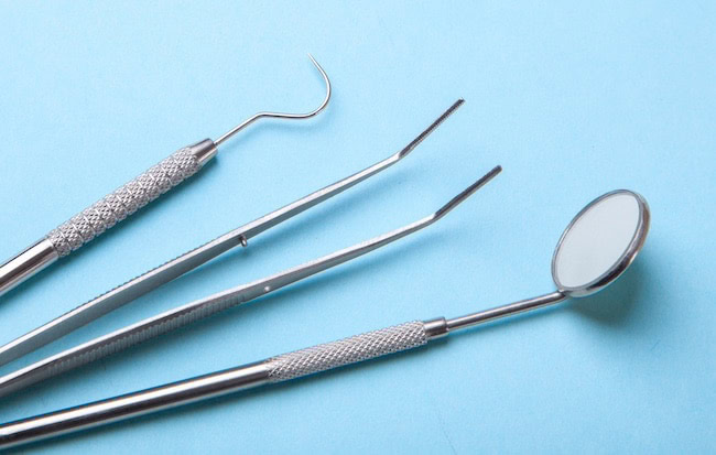Dental instruments. Dental mirror, probe hook, tweezers